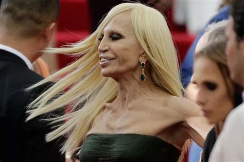 Donatella Versace shows off worryingly thin frame in strapless 